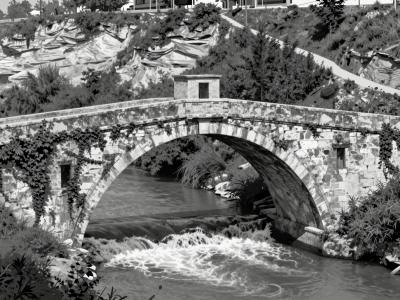AI-generated illustration of Ponte Romano (Roman Bridge)