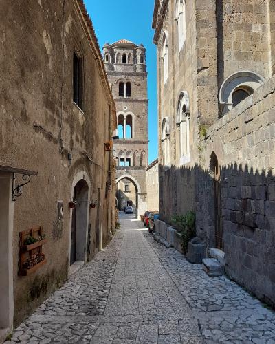 A medieval lane in Casertavecchia with its bell tower