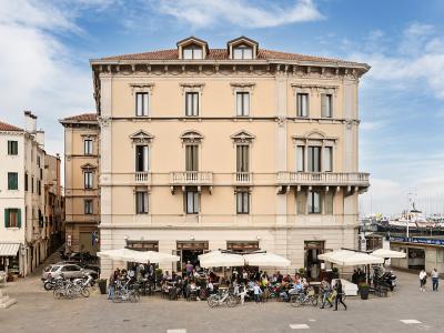 Café tables on a square in Chioggia