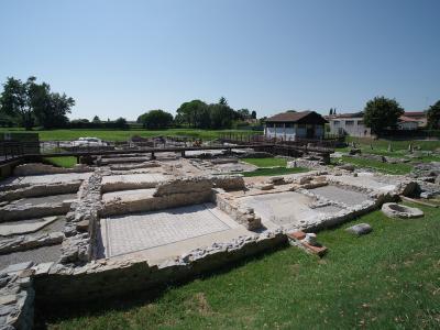 Excavated Roman house foundations in the archaeological area of Aquileia