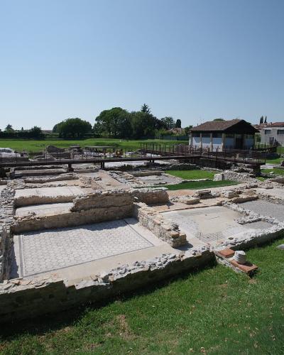 Excavated Roman house foundations in the archaeological area of Aquileia