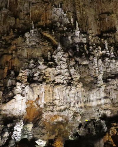 Stalactites and stalagmites in the great chamber of the Grotta Gigante
