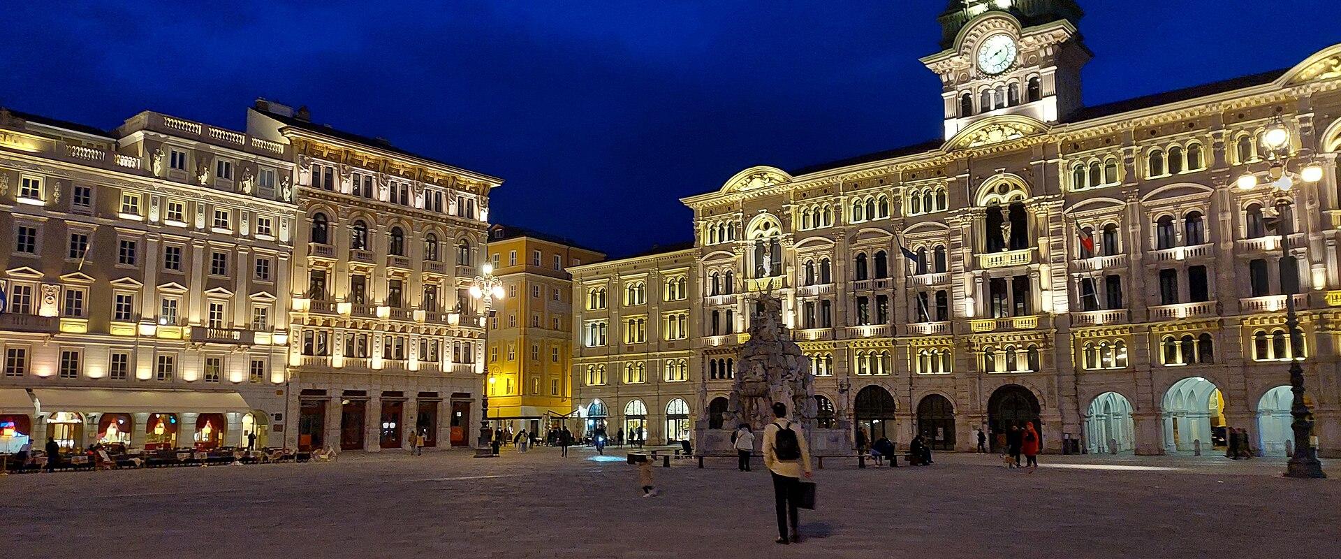 Piazza Unità d'Italia in Trieste lit up at blue hour