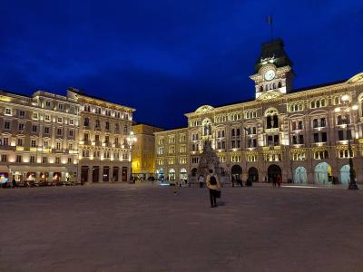 Piazza Unità d'Italia in Trieste lit up at blue hour