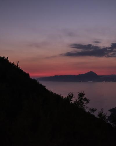 The Christ the Redeemer statue above Maratea at sunset