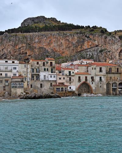 Cefalù waterfront beneath La Rocca