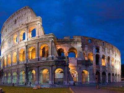 The Colosseum in Rome illuminated at dusk