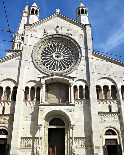 The Romanesque facade of Modena Cathedral