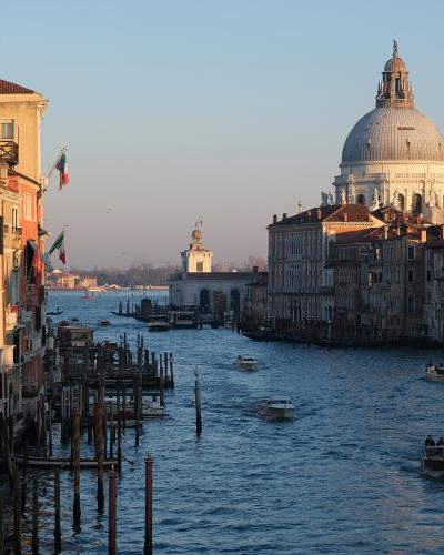 The Grand Canal and the dome of Santa Maria della Salute at golden hour, Venice